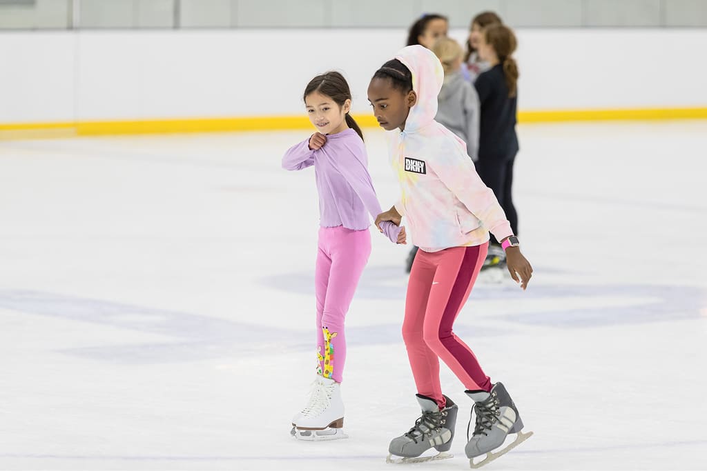 2-girls-ice-skating